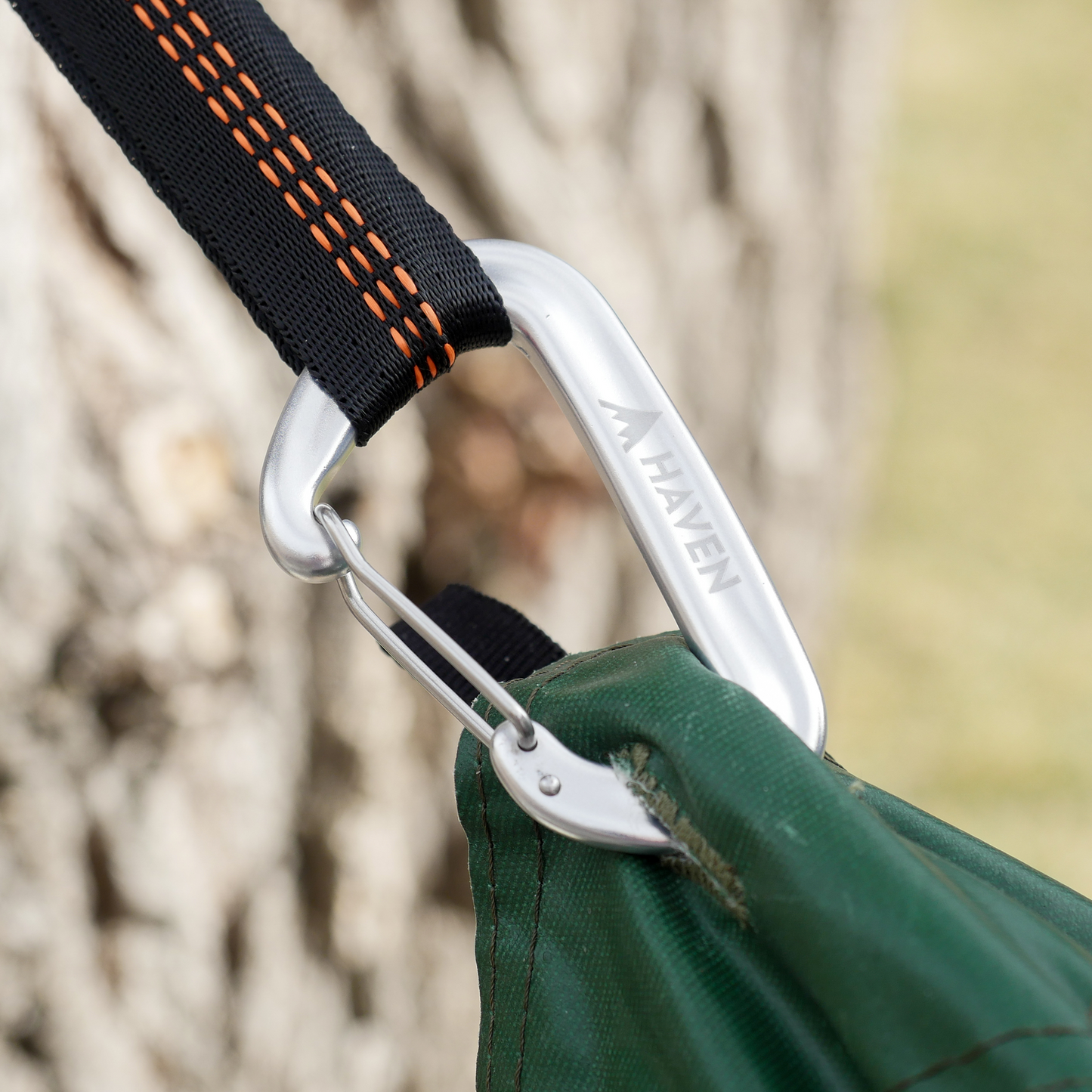 Carabiner attached to lay flat hammock tent