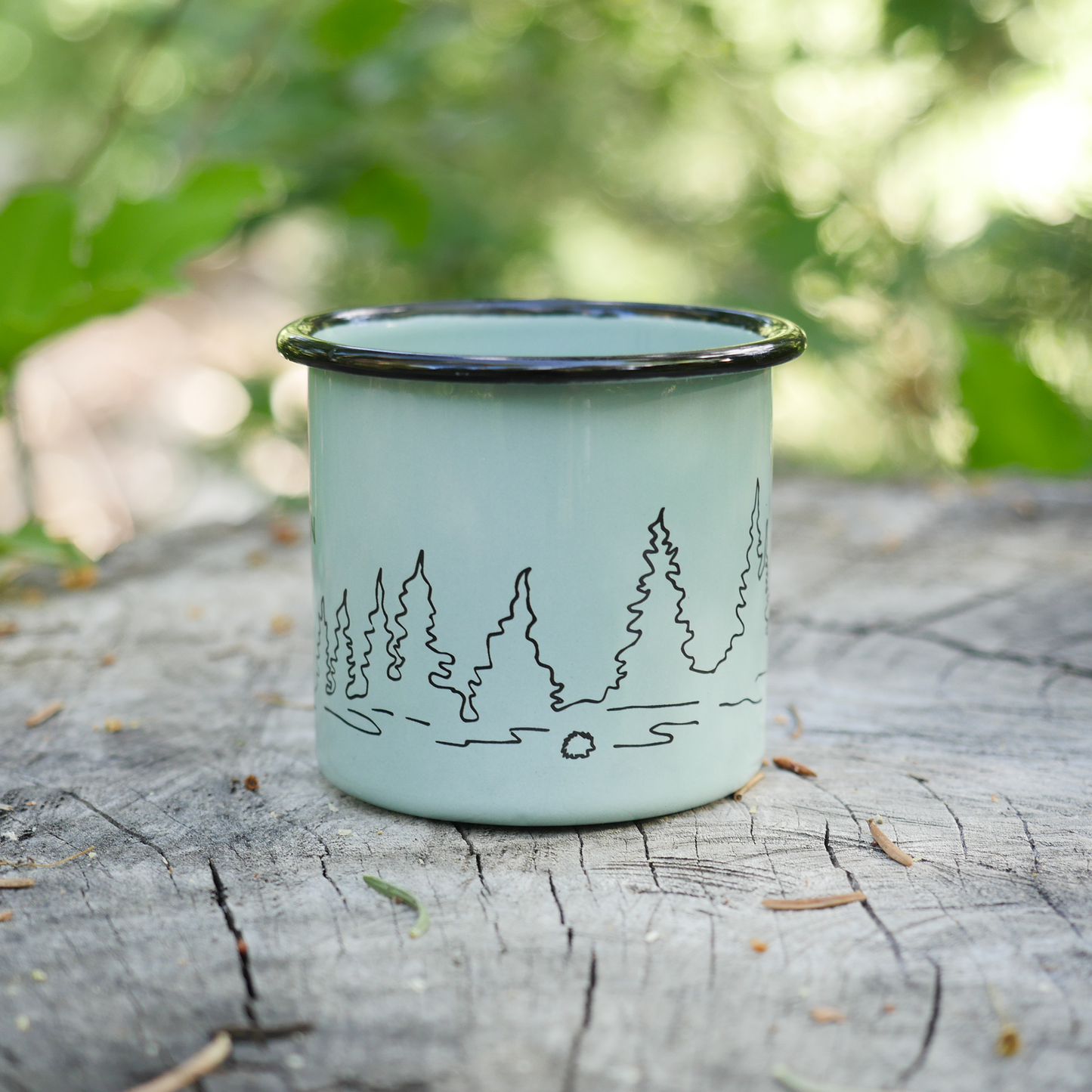 Light blue durable camping mug with porcupine and trees illustration