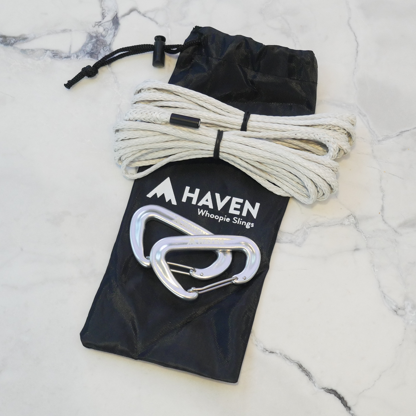 Slings and carabiners for hanging a portable camping hammock