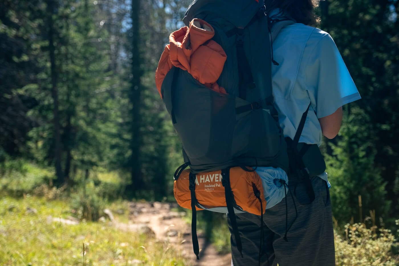 Haven Tent strapped to a backpack for backpacking