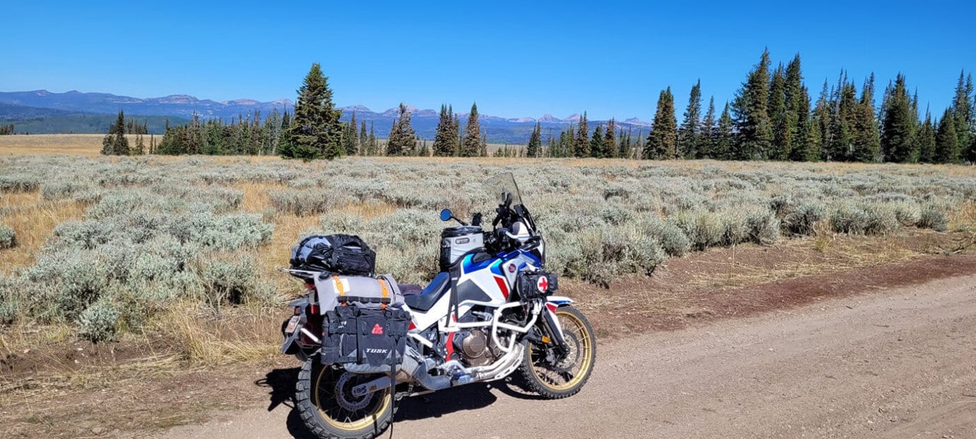 ADV Motorcycle with trees in backgound