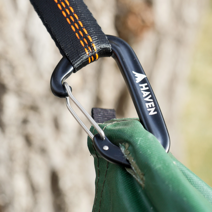 Detail shot of carabiner attached to hammock camping tent