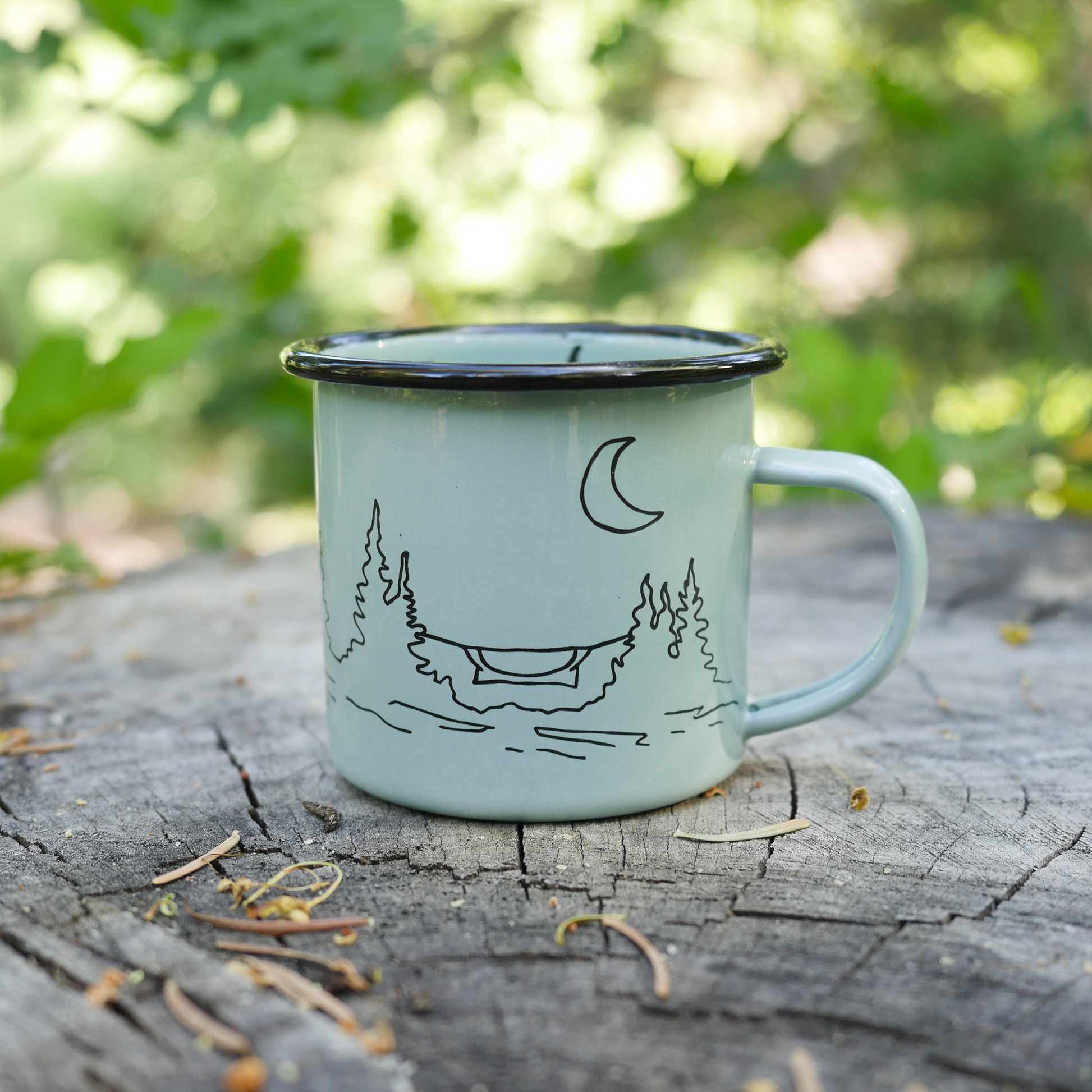 Light blue durable camping mug with campsite illustration
