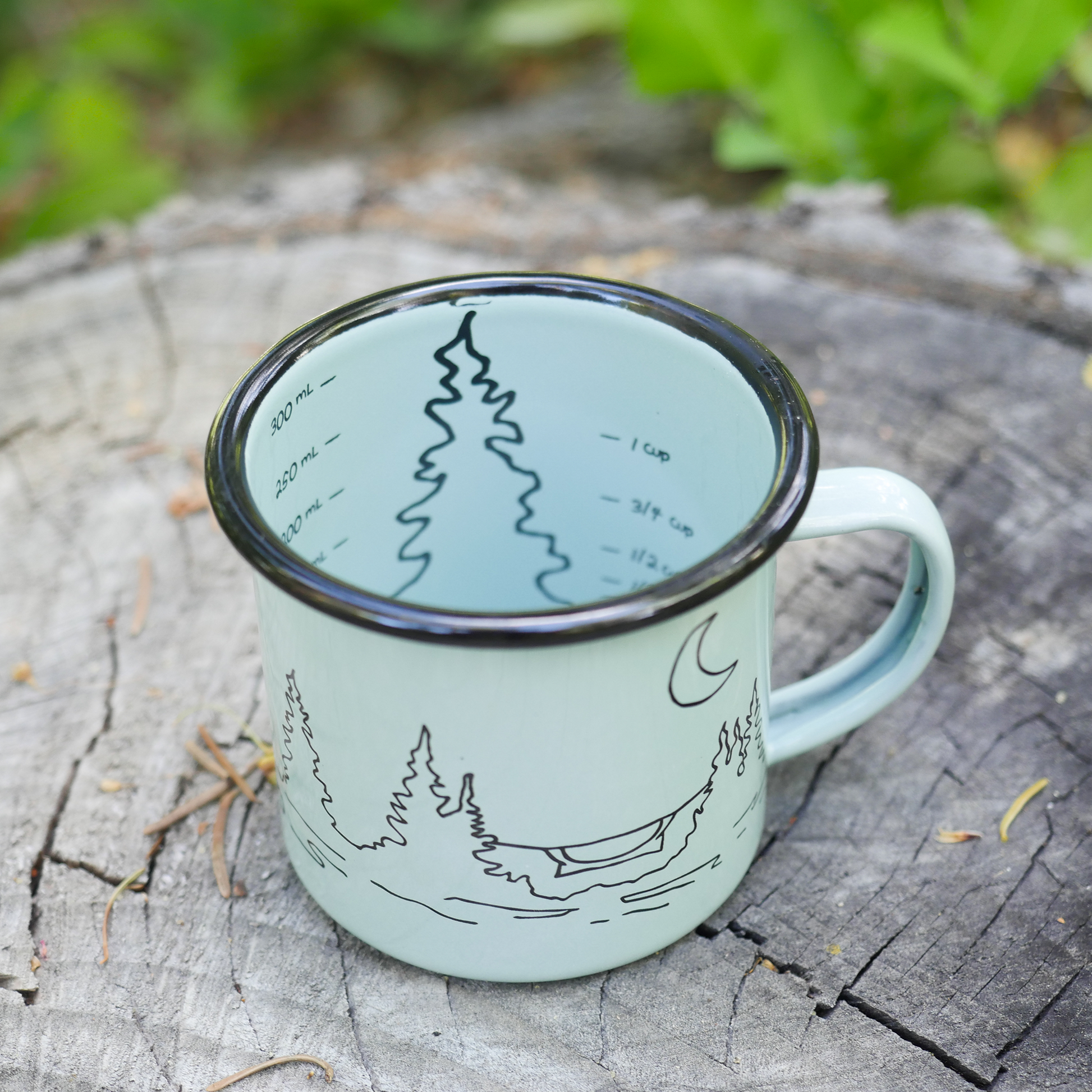 Light blue camping mug that doubles as a measuring cup