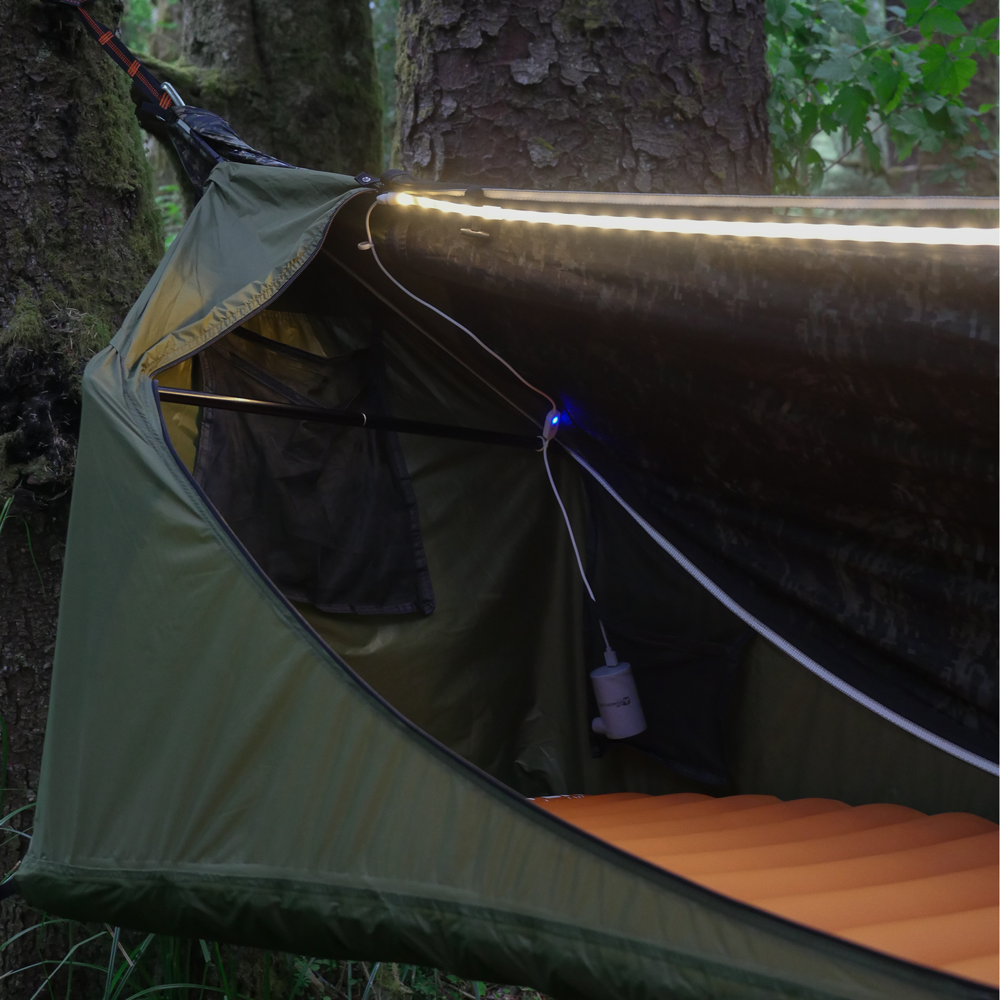 Close up of hammock tent light and its charging cord