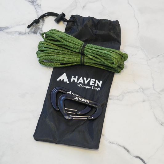 Slings and carabiners for hanging a camping hammock
